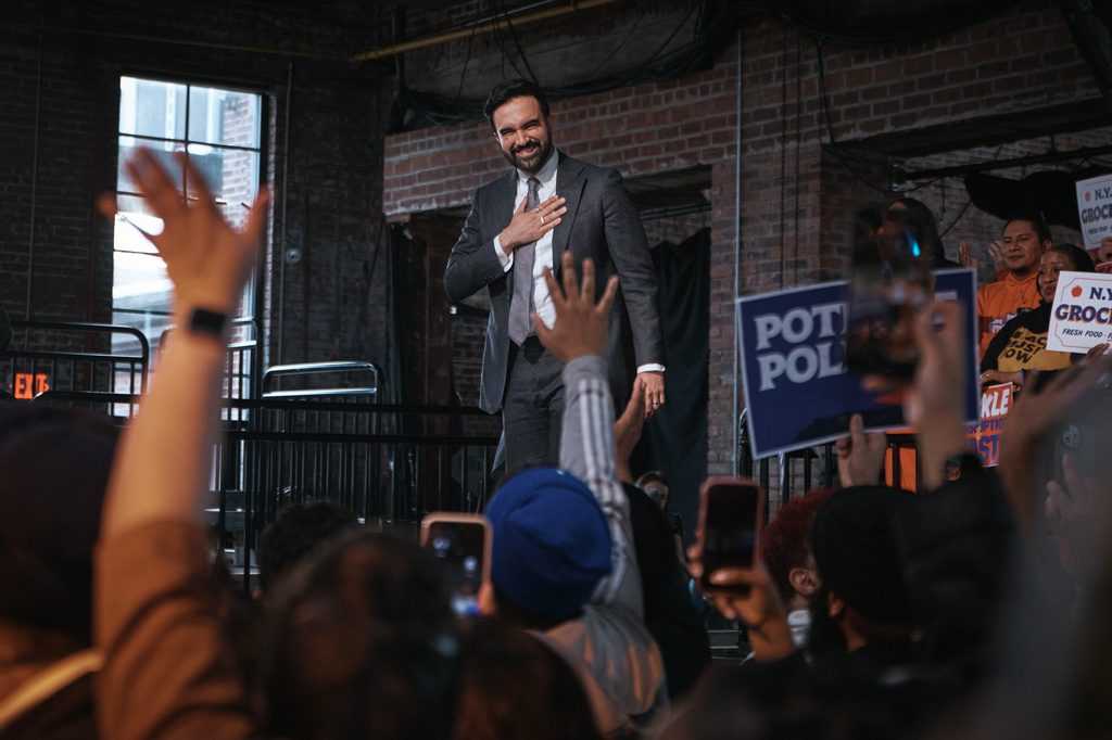New York City Mayor Zohran Mamdani salutes his supporters during an address marking his first 100 days in office at the Knockdown Center on Sunday, April 12, 2026, in New York. (AP Photo/Andres Kudacki)