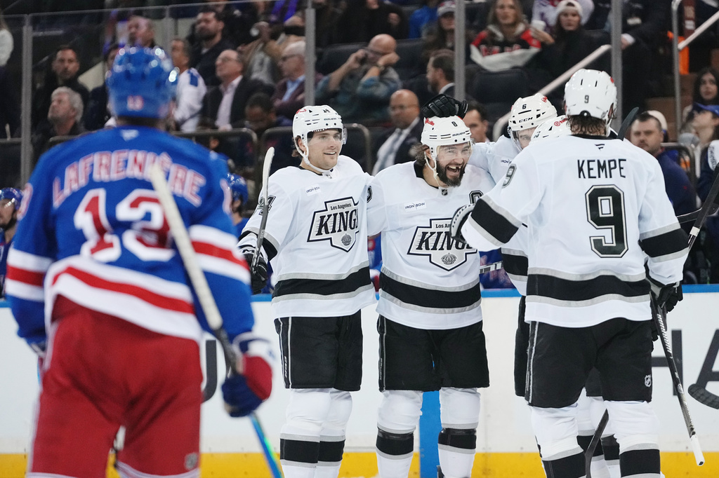 Los Angeles Kings' Drew Doughty, center, celebrates with teammates after scoring a goal during the first period of an NHL hockey game against the New York Rangers Monday, Oct. 26, 2026, in New York. (AP Photo/Frank Franklin II)