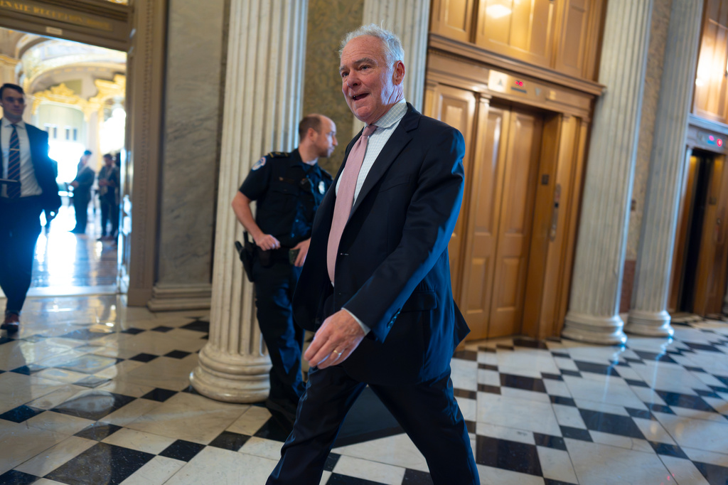 Sen. Tim Kaine, D-Va., arrives at the chamber ahead of a vote on a war powers resolution, at the Capitol in Washington, Thursday, Sept. 24, 2026. (AP Photo/J. Scott Applewhite)