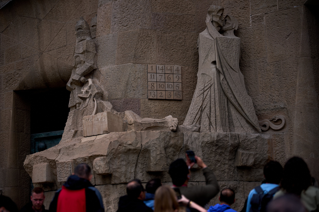 A detail of the Passion Façade shows the basilica's famous magic square at the Sagrada Família in Barcelona, Spain, May 15, 2026. Unlike a sudoku, every row, column and diagonal adds up to 33, symbolizing the age of Christ at his death.(AP Photo/Emilio Morenatti)
