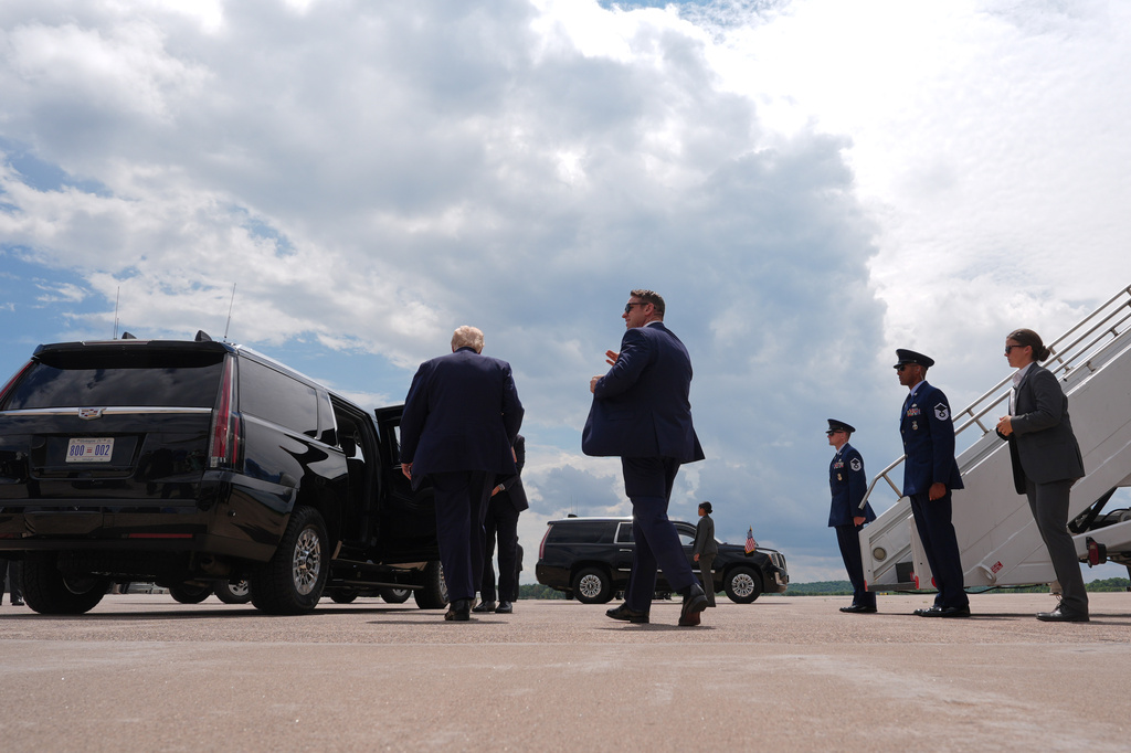 President Donald Trump walks to his motorcade vehicle after talking with reporters Friday, June 5, 2026, at Chippewa Valley Regional Airport in Eau Claire, Wis. (AP Photo/Mark Schiefelbein)