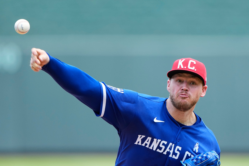 Kansas City Royals starting pitcher Stephen Kolek throws during the first inning of a baseball game against the St. Louis Cardinals, Sunday, June 21, 2026, in Kansas City, Mo. (AP Photo/Charlie Riedel)