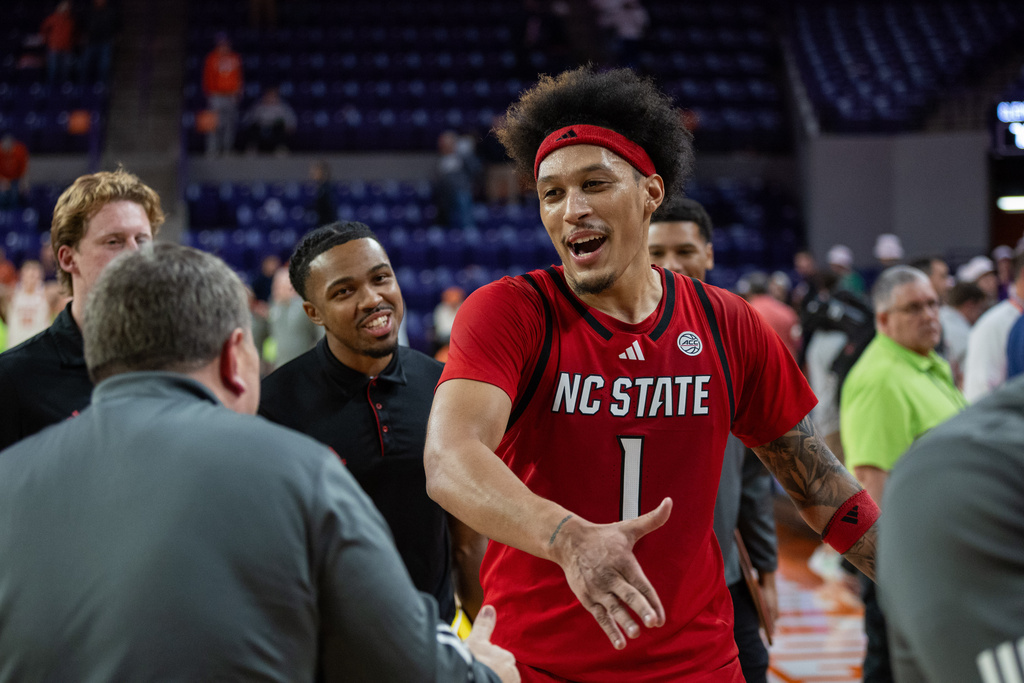 North Carolina State forward Darrion Williams (1) celebrates after defeating Clemson in an NCAA college basketball game, Tuesday, Jan. 20, 2026, in Clemson, S.C. (AP Photo/Scott Kinser)