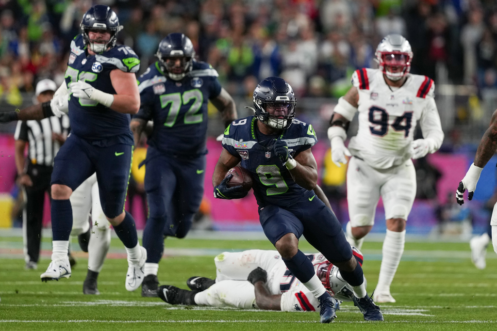 Seattle Seahawks running back Kenneth Walker III (9) carries during the second half of the NFL Super Bowl 60 football game against the New England Patriots, Sunday, Feb. 8, 2026, in Santa Clara, Calif. (AP Photo/Matt Slocum)