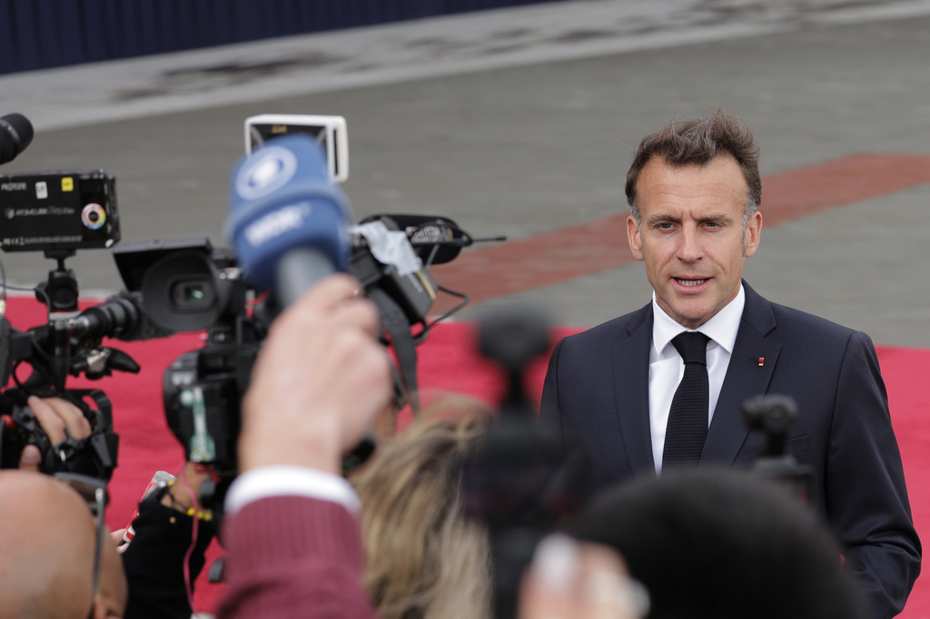 French President Emmanuel Macron speaks with the media as he arrives for a meeting of the European Political Community in Yerevan, Armenia, Monday, May 4, 2026. (AP Photo/Anthony Pizzoferrato)