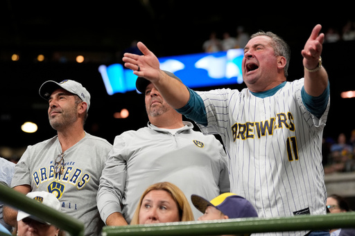 Milwaukee Brewers fans react during the sixth inning in Game 2 of baseball's National League Championship Series against the Los Angeles Dodgers, Tuesday, Oct. 14, 2025, in Milwaukee. (AP Photo/Brynn Anderson) Milwaukee Brewers fans react during the sixth inning in Game 2 of baseball's National League Championship Series against the Los Angeles Dodgers, Tuesday, Oct. 14, 2025, in Milwaukee. (AP Photo/Brynn Anderson)