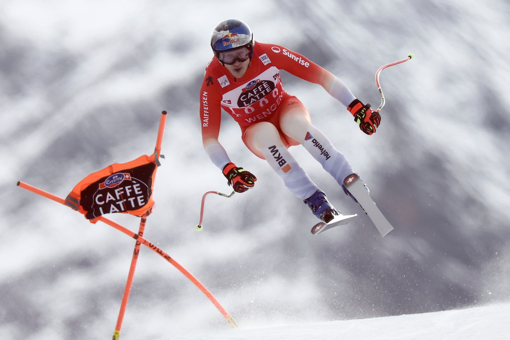 Switzerland's Marco Odermatt speeds down the course during an alpine ski, men's World Cup downhill, in Wengen, Switzerland, Saturday, Jan. 17, 2026. (AP Photo/Gabriele Facciotti)