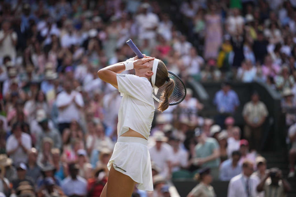 Karolina Muchova of the Czech Republic celebrates her victory against Coco Gauff of the United States in their semifinal women's singles match at the Wimbledon Tennis Championships in London, Thursday, July 9, 2026. (AP Photo/Kin Cheung)