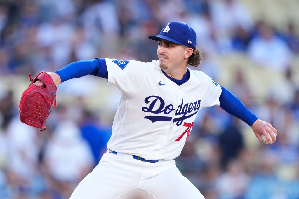 Los Angeles Dodgers starting pitcher Justin Wrobleski throws to the plate during the first inning of a baseball game against the Colorado Rockies, Tuesday, July 7, 2026, in Los Angeles. (AP Photo/Mark J. Terrill)