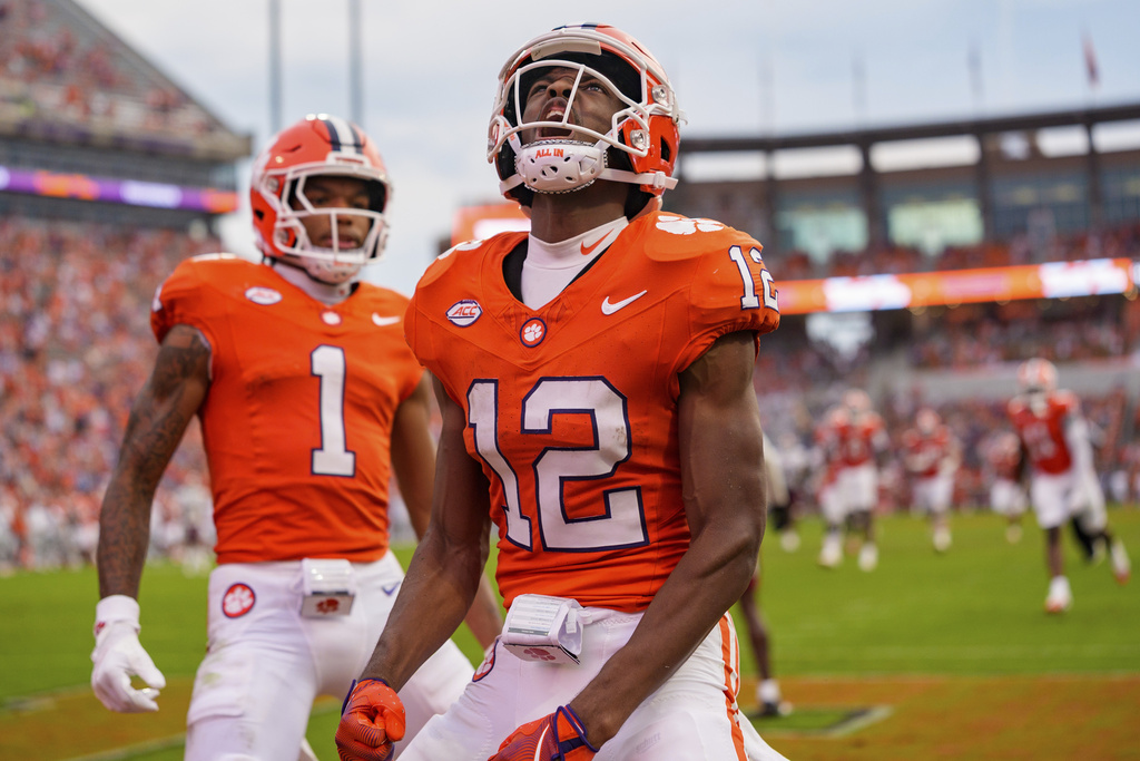 Clemson wide receiver Bryant Wesco Jr. (12) celebrates in the second half of an NCAA college football game against Troy, Saturday, Sept. 6, 2025, in Clemson, S.C. (AP Photo/Jacob Kupferman)