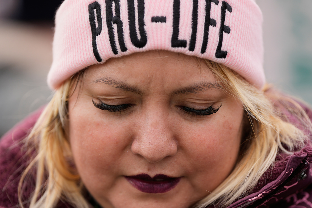 An anti-abortion demonstrator attends the annual March for Life, Friday, Jan. 23, 2026, in Washington. (AP Photo/Julia Demaree Nikhinson)
