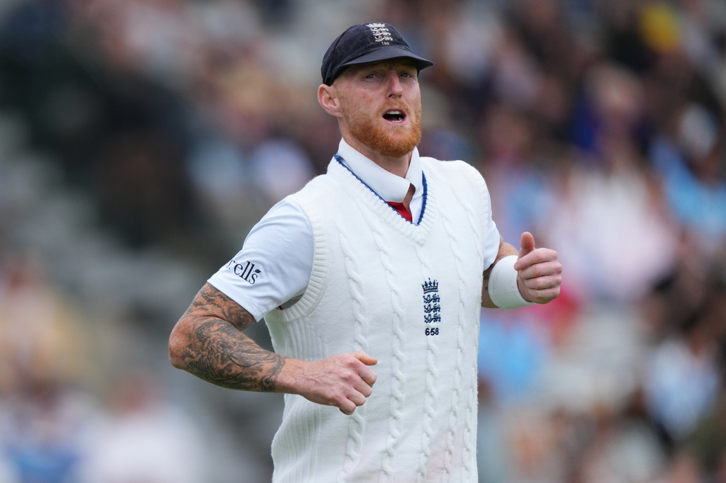 FILE - England's captain Ben Stokes walks onto the field before the start of play on the fourth day of the Test match between England and New Zealand at Lord's cricket ground in London, Sunday, June 7, 2026. (AP Photo/Kirsty Wigglesworth, File)
