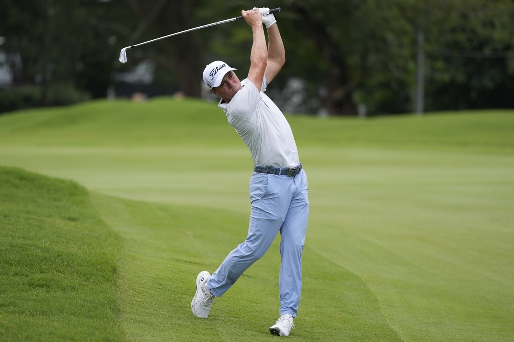 Justin Thomas hits from the first fairway during the first round of the Tour Championship golf tournament, Thursday, Aug. 21, 2025, in Atlanta. (AP Photo/Mike Stewart)
