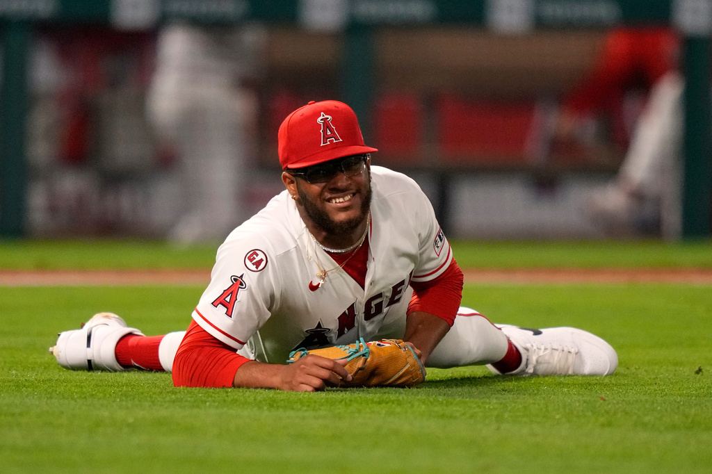 Los Angeles Angels pitcher Walbert Urena lays on the ground after being hit by a ball batted by New York Mets' Bo Bichette during the sixth inning of a baseball game Friday, May 1, 2026, in Anaheim, Calif. (AP Photo/Mark J. Terrill)