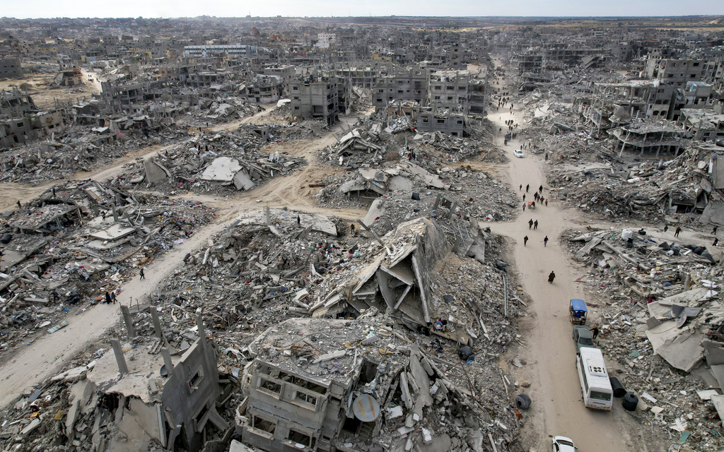 FILE - Displaced Palestinians return to Rafah, Gaza Strip, Jan. 20, 2025, a day after a ceasefire deal between Israel and Hamas went into effect. (AP Photo/Jehad Alshrafi, File)