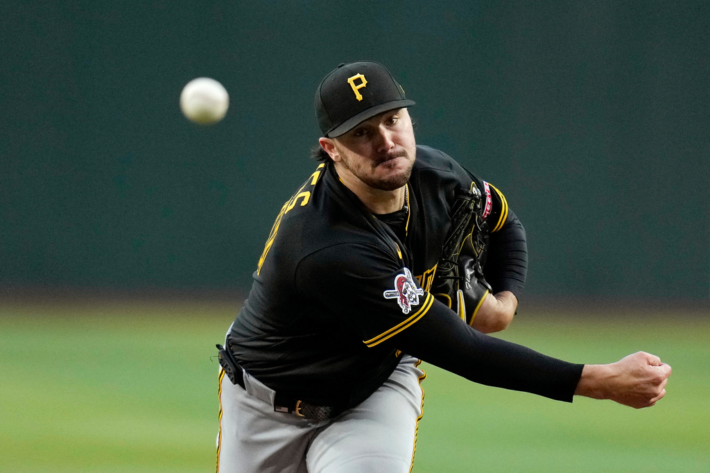 Pittsburgh Pirates starting pitcher Paul Skenes warms up during the first inning of a baseball game against the Arizona Diamondbacks, Wednesday, May 6, 2026, in Phoenix. (AP Photo/Ross D. Franklin)