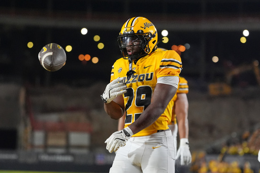 Missouri running back Ahmad Hardy celebrates after scoring during the first half of an NCAA college football game against Massachusetts Saturday, Sept. 27, 2025, in Columbia, Mo. (AP Photo/Jeff Roberson) Missouri running back Ahmad Hardy celebrates after scoring during the first half of an NCAA college football game against Massachusetts Saturday, Sept. 27, 2025, in Columbia, Mo. (AP Photo/Jeff Roberson)