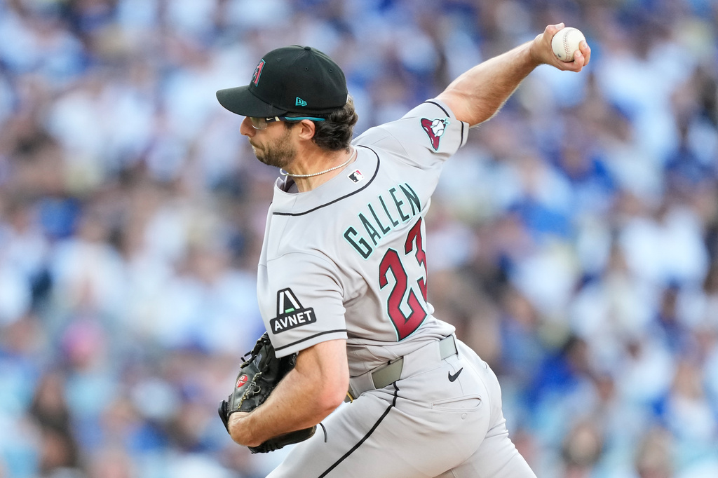 Arizona Diamondbacks pitcher Zac Gallen works against the Los Angeles Dodgers during the second inning of an opening-day baseball game Thursday, March 26, 2026, in Los Angeles. (AP Photo/Mark J. Terrill)