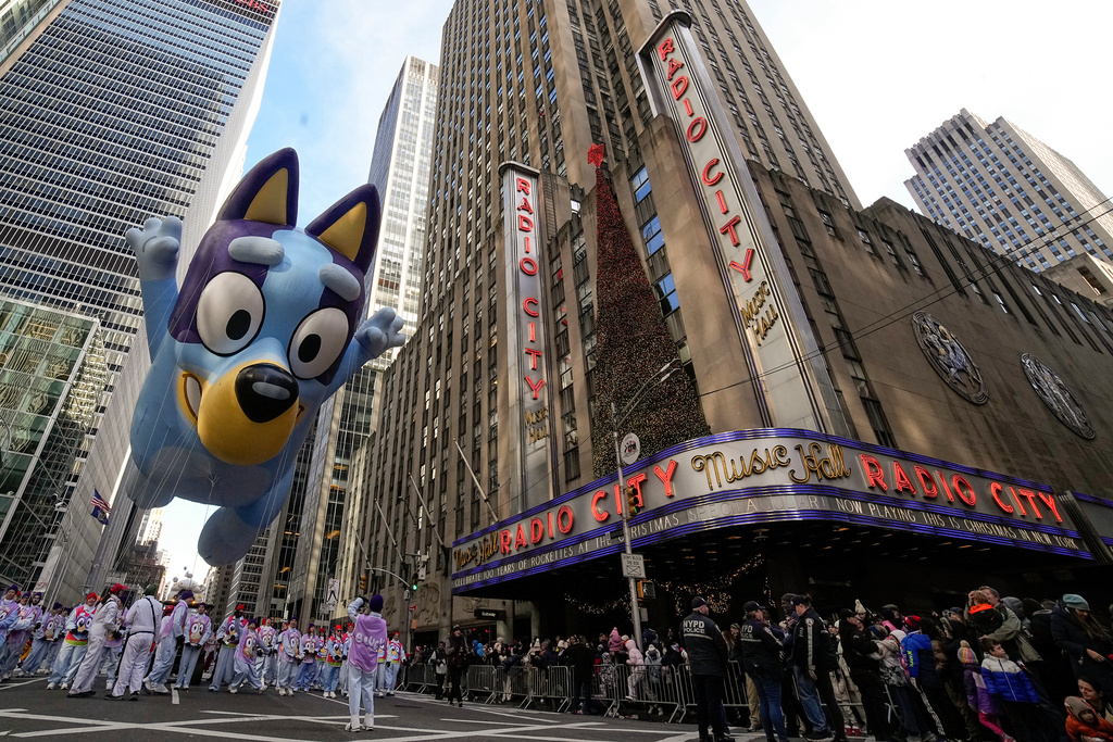 The Bluey balloon floats down Sixth Avenue during the Macy's Thanksgiving Day Parade, Thursday, Nov. 27, 2025, in New York. (AP Photo/Eduardo Munoz Alvarez)