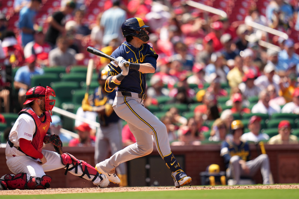 Milwaukee Brewers' Christian Yelich watches his RBI double during the seventh inning in the first game of a baseball doubleheader against the St. Louis Cardinals Tuesday, July 7, 2026, in St. Louis. (AP Photo/Jeff Roberson)