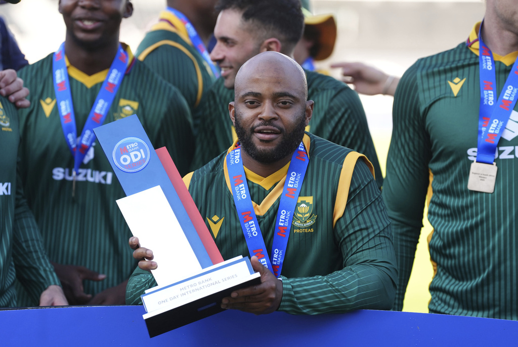 South Africa's Temba Bavuma with the trophy after winning Metro Bank One Day International series after the third ODI series cricket match between England and South Africa, at Utilita Bowl, Southampton, England, Sunday Sept. 7, 2025. (Adam Davy/PA via AP)