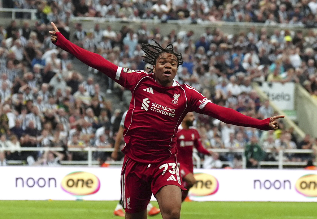 Liverpool's Rio Ngumoha celebrates after scoring his side's third goal during the English Premier League soccer match between Liverpool and Newcastle United at St James' Park, Newcastle, England, Monday Aug. 25, 2025. (Owen Humphreys/PA via AP)