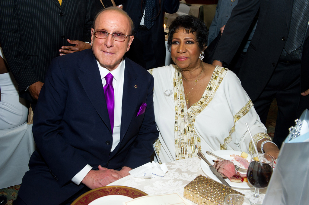 FILE - Clive Davis, left, appears with Aretha Franklin at Aretha's 69th birthday party, in New York, Friday, March 25, 2011. (AP Photo/Charles Sykes, File)