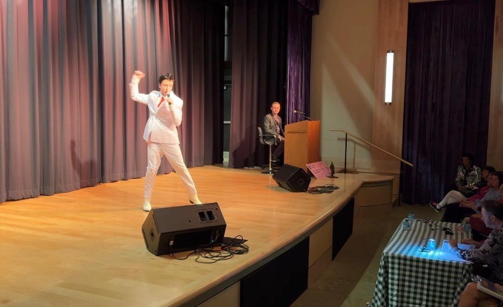 In this screenshot from video, Ayden Maloy, 16, performs at the Tupelo Elvis Festival's youth tribute artists competition on June 4, 2026, in Tupelo, Miss. (AP Photo/Sophie Bates)