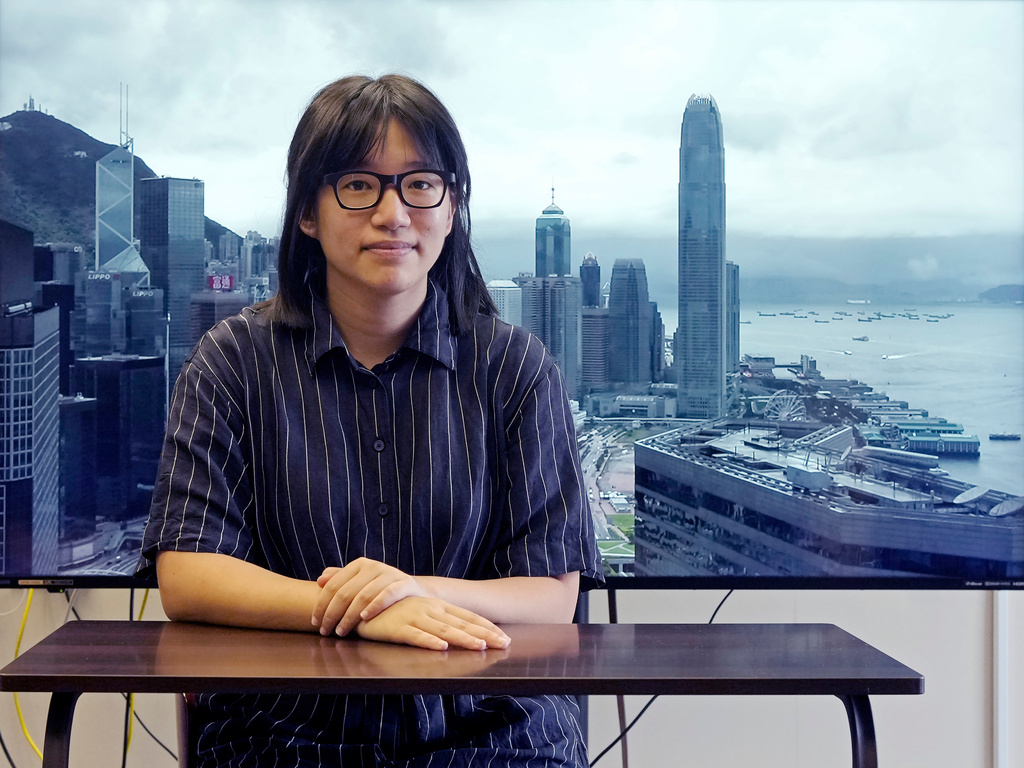 FILE - Chow Hang-tung, vice chairperson of the Hong Kong Alliance in Support of the Democratic Patriotic Movements of China, poses after an interview in Hong Kong on May 24, 2021. (AP Photo/Vincent Yu, File)