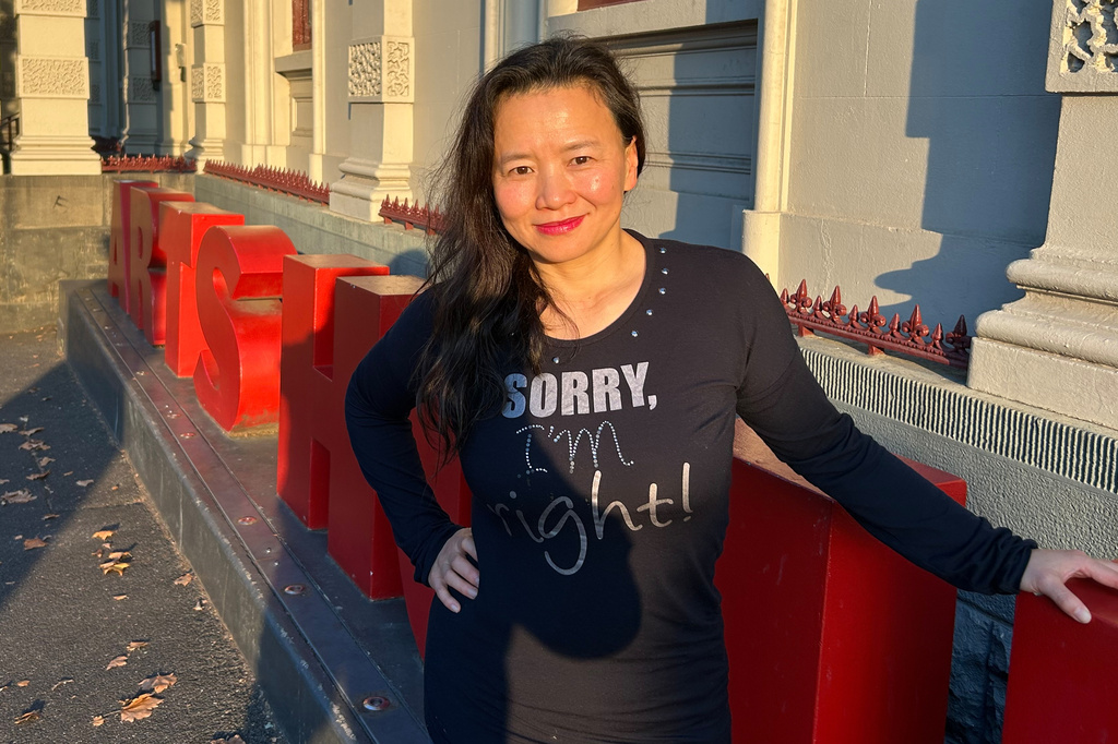 Cheng Lei poses for a photo at the Arts House performance space at the North Melbourne Town Hall in Melbourne, Australia, April 29, 2026. (AP Photo/Rod McGuirk)