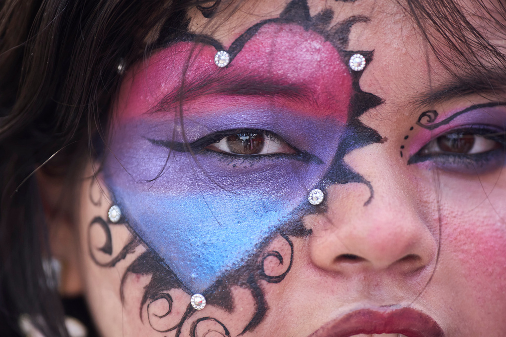 A participant has face painted as members of the LGBTQ+ community and supporters take out a Pride Month rally in Kathmandu, Nepal, on Saturday, June 13, 2026. (AP Photo/Niranjan Shrestha)