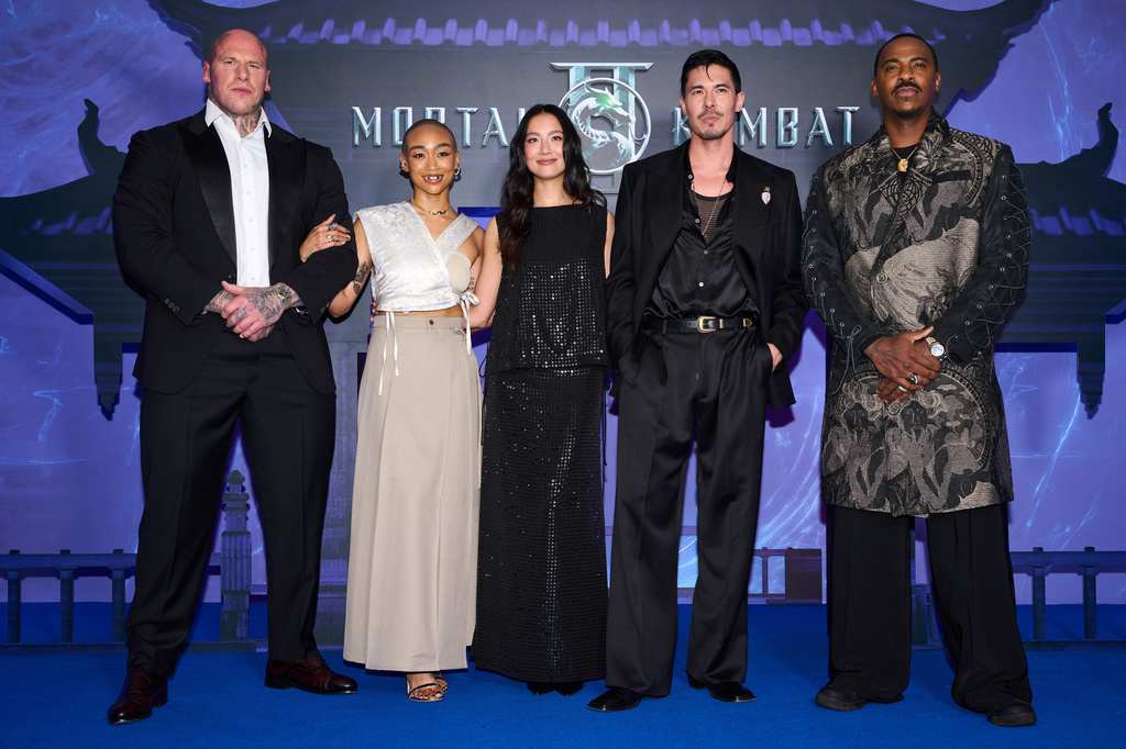 Martyn Ford, from left, Tati Gabrielle, Adeline Rudolph, Lewis Tan and Mehcad Brooks pose for photographers upon arrival at the European Fan Event of the film 'Mortal Kombat II' on Thursday, April 30, 2026, in London. (Photo by Scott A Garfitt/Invision/AP)