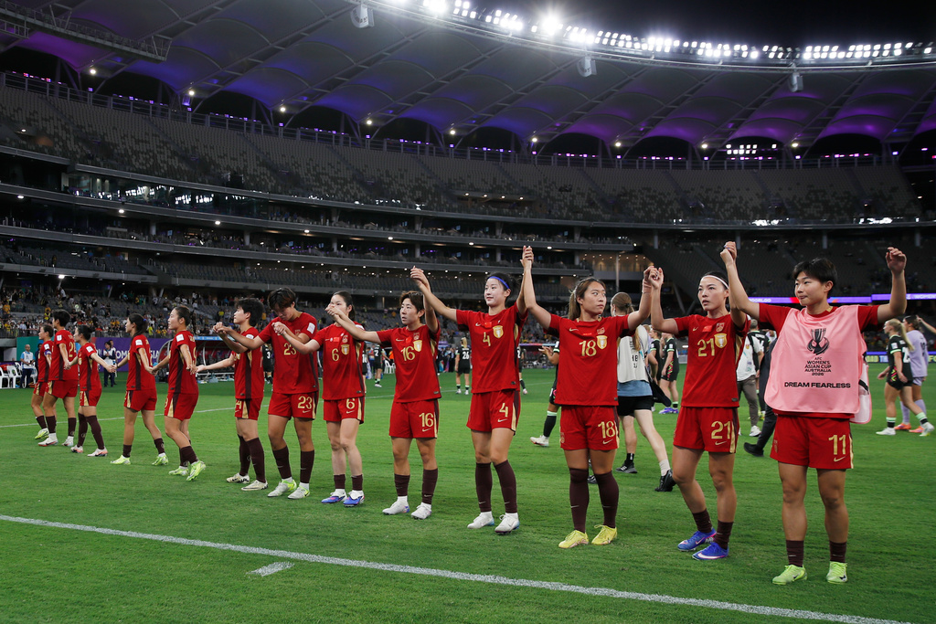 China gestures to their supporters following the Women's Asian Cup semifinal soccer match between China and Australia in Perth, Australia, Tuesday, March 17, 2026. (AP Photo/Gary Day)