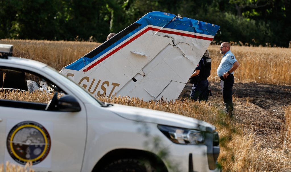 Forensic technicians examine the wreckage of the Cessna 421 piloted by Ubisoft co-founder Claude Guillemot, who was killed when the aircraft crashed while approaching La Baule-Escoublac airfield Friday evening, in La Baule, western France, Saturday, June 20, 2026. (AP Photo/Jeremia Gonzalez)