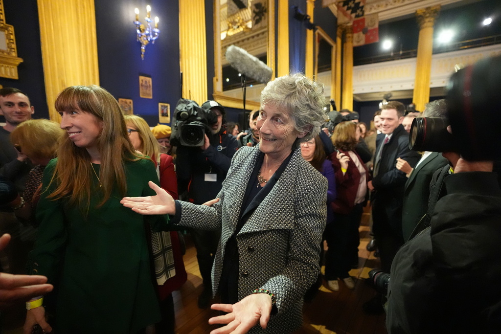 Left-wing independent presidential candidate Catherine Connolly arrives at Dublin Castle for the count in Ireland's presidential election to replace Michael D. Higgins, who has served the maximum two seven-year terms, on Saturday, Oct. 25, 2025. (Niall Carson/PA via AP)