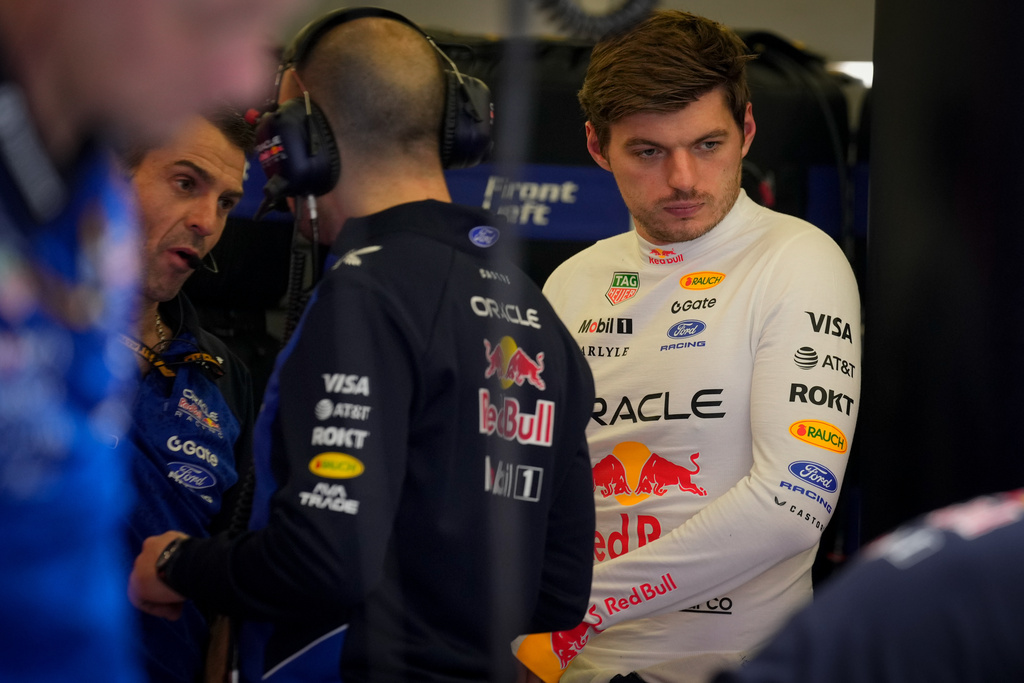 Red Bull driver Max Verstappen of the Netherlands looks on as mechanics prepare his car during the third day of Formula One pre-season test at the Bahrain International Circuit in Sakhir, Bahrain, Friday, Feb. 13, 2026. (AP Photo/Altaf Qadri)