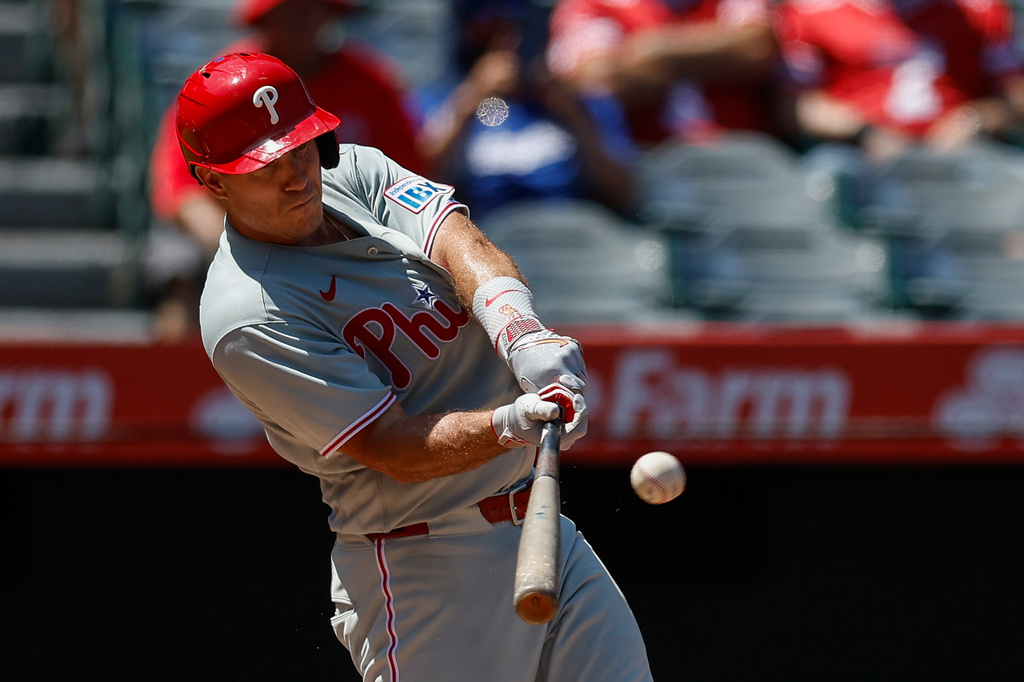 Philadelphia Phillies' J.T. Realmuto hits a solo home run during the third inning of a baseball game against the Los Angeles Angels, Sunday, Aug. 30, 2026, in Anaheim, Calif. (AP Photo/Caroline Brehman)