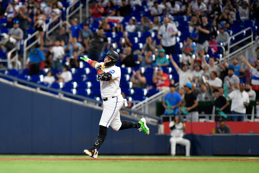 Miami Marlins' Heriberto Hernández rounds the bases after hitting a home run during the second inning of a baseball game against the Washington Nationals, Saturday, Aug. 22, 2026, in Miami. (AP Photo/Michael Laughlin)