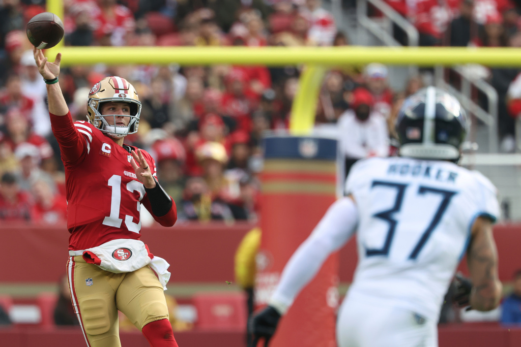 San Francisco 49ers quarterback Brock Purdy (13) throws a pass during the first half of an NFL football game against the Tennessee Titans, Sunday, Dec. 14, 2025, in Santa Clara, Calif. (AP Photo/Jed Jacobsohn)