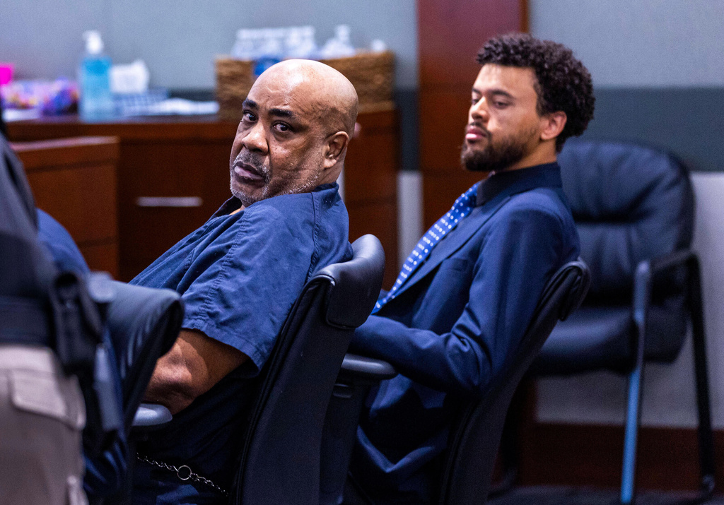 FILE - Duane Davis, left, looks back during a hearing on claims of juror misconduct in his jailhouse battery case at the Regional Justice Center, July 2, 2025, in Las Vegas. (L.E. Baskow/Las Vegas Review-Journal via AP, Pool, File)