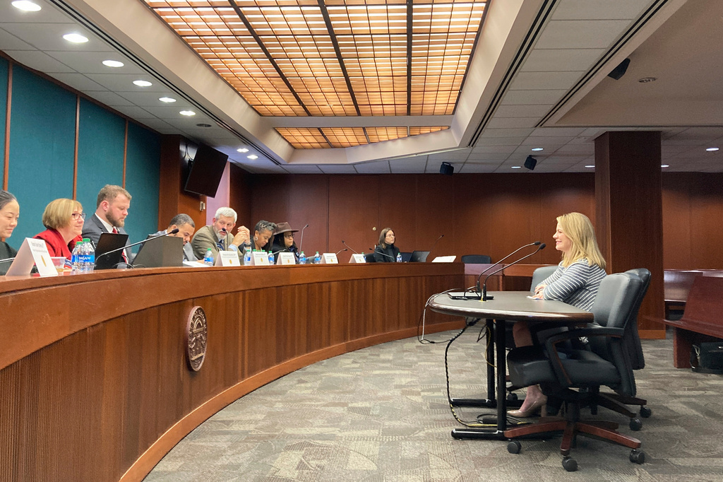 FILE - Georgia Human Services Commissioner Candice Broce, right, testifies in favor of a bill that would slow the flow of children into foster care, Feb. 16, 2023, at the state Capitol in Atlanta. A juvenile judge testified on Monday, Oct. 30, that such laws serve the interest of the state's child welfare agency, but not children. (AP Photo/Jeff Amy, File)