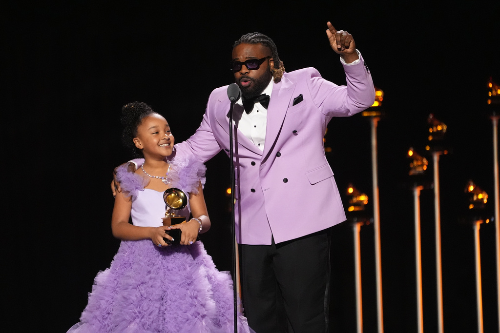 Aura V, left, and Fyutch accept the award for best children's music album for "Harmony" during the 68th annual Grammy Awards on Sunday, Feb. 1, 2026, in Los Angeles. (AP Photo/Chris Pizzello)
