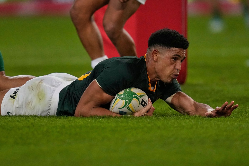 South Africa's Sacha Feinberg-Mngomezulu scores a try during a rugby championship test match between South Africa and Argentina, in Durban, South Africa, Saturday, Sept. 27, 2025. (AP Photo/Themba Hadebe)
