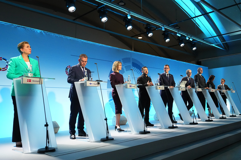 From left, Danish Prime Minister Mette Frederiksen, Finnish Prime Minister Petteri Orpo, Iceland's Prime Minister Kristrun Mjoll Frostadottir, Ukraine's President Volodymyr Zelenskyy, Estonia's Prime Minister Kristen Michal, Norwegian Prime Minister Jonas Gahr Store, Latvia's Prime Minister Andris Kulbergs, Lithuania's Prime Minister Inga Ruginiene and Sweden's Prime Minister Ulf Kristersson attend a news conference after the Nordic and Baltic countries meeting in Tallinn, Estonia, Tuesday, June 9, 2026. (AP Photo/Sergei Grits)