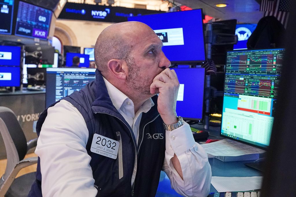 Specialist James Denaro works at his post on the floor of the New York Stock Exchange, Monday, April 20, 2026. (AP Photo/Richard Drew)