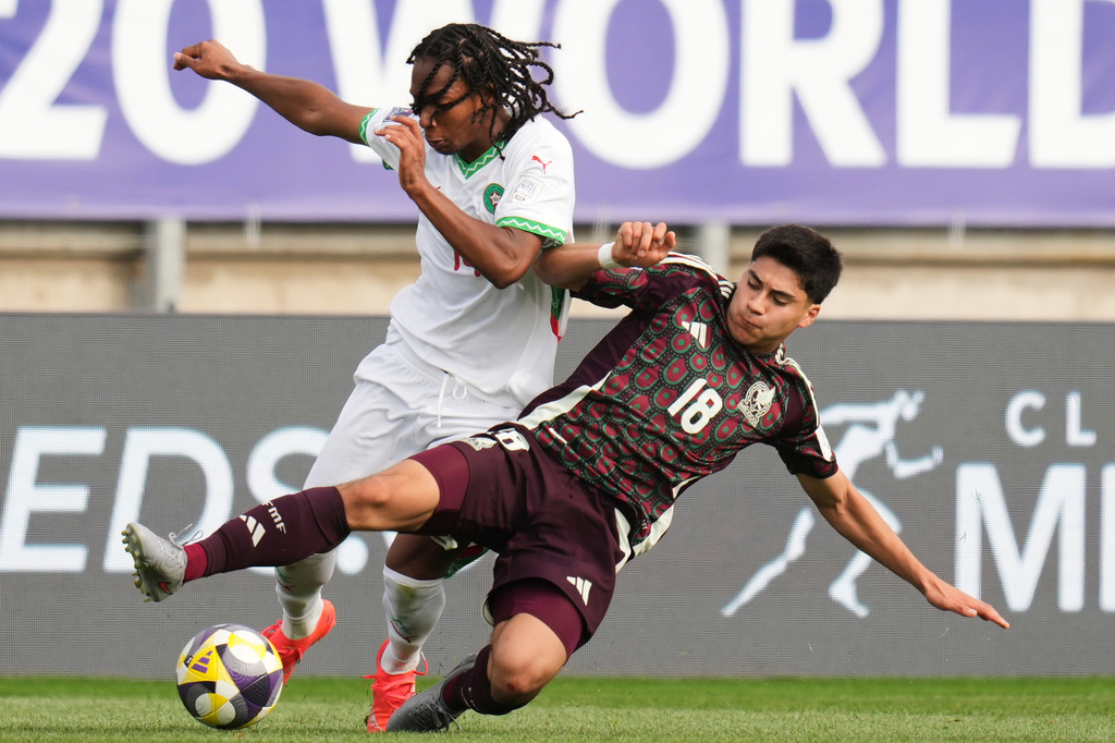 FILE - Mexico's Obed Vargas, right, and Morocco's Mohamed Hamony battle for the ball during a FIFA U-20 World Cup Group C soccer match at Elias Figueroa Brander Stadium in Valparaiso, Chile, Saturday, Oct. 4, 2025. (AP Photo/Andre Penner, File)