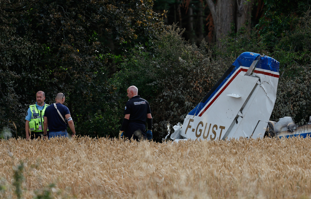 Forensic technicians examine the wreckage of the Cessna 421 piloted by Ubisoft co-founder Claude Guillemot, who was killed when the aircraft crashed while approaching La Baule-Escoublac airfield Friday evening in La Baule, western France, Saturday, June 20, 2026. (AP Photo/Jeremia Gonzalez)