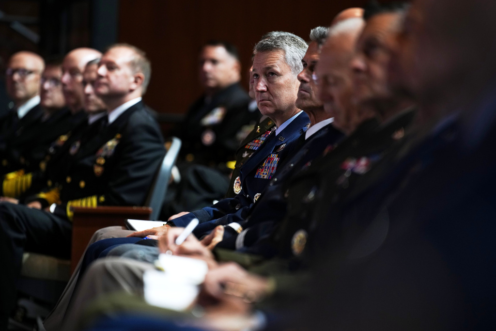 U.S. military senior leadership listen as Secretary of Defense Pete Hegseth speaks at Marine Corps Base Quantico, Tuesday, Sept. 30, 2025 in Quantico, Va. (Andrew Harnik/Pool via AP)