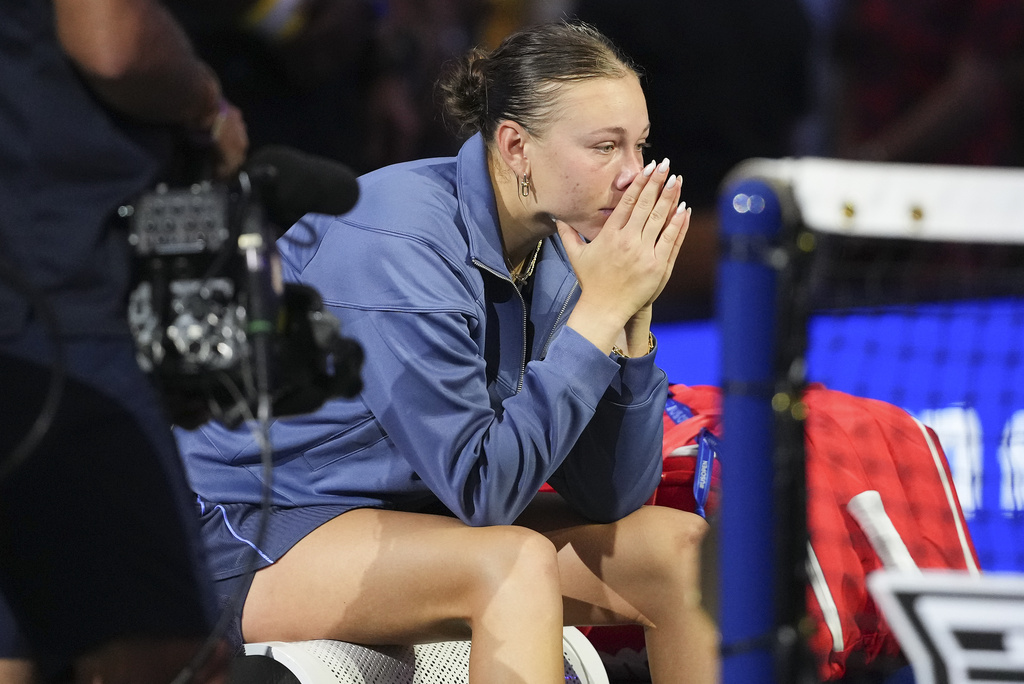 Amanda Anisimova, of the United States, sits on her bench after losing to Aryna Sabalenka, of Belarus, in the women's singles final of the U.S. Open tennis championships, Saturday, Sept. 6, 2025, in New York. (AP Photo/Kirsty Wigglesworth)