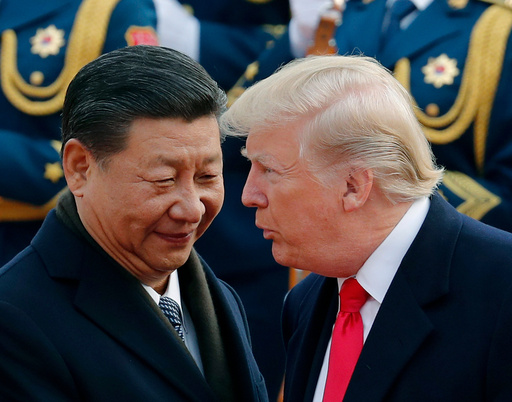 FILE - In this Nov. 9, 2017, file photo, U.S. President Donald Trump, right, chats with Chinese President Xi Jinping during a welcome ceremony at the Great Hall of the People in Beijing. (AP Photo/Andy Wong, File) FILE - In this Nov. 9, 2017, file photo, U.S. President Donald Trump, right, chats with Chinese President Xi Jinping during a welcome ceremony at the Great Hall of the People in Beijing. (AP Photo/Andy Wong, File)